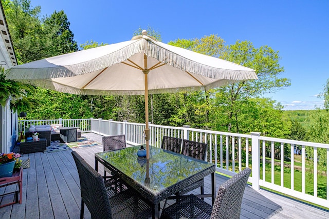 543 Middle Rd, Dresden, ME 04342 - deck with an outdoor living space and outdoor dining area