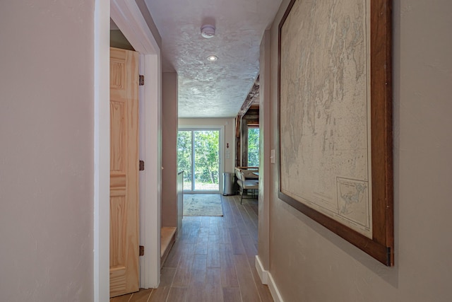 543 Middle Rd, Dresden, ME 04342 - corridor featuring light wood-style floors and baseboards