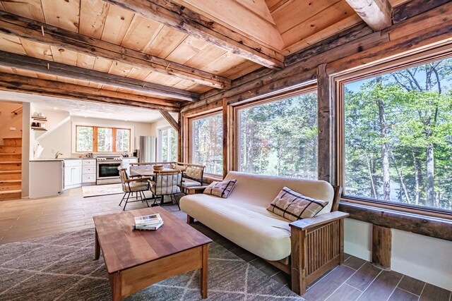 543 Middle Rd, Dresden, ME 04342 - living room featuring wood ceiling with exposed beams, wood finished floors, and stairs