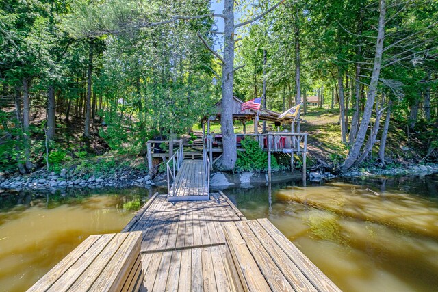 543 Middle Rd, Dresden, ME 04342 - dock with view of scattered trees
