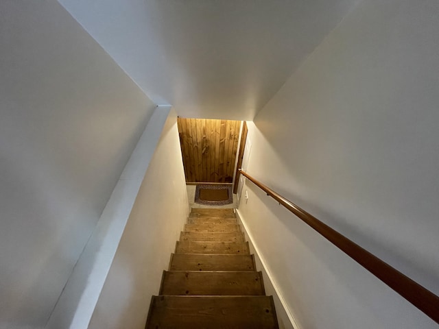 stairway featuring hardwood / wood-style floors