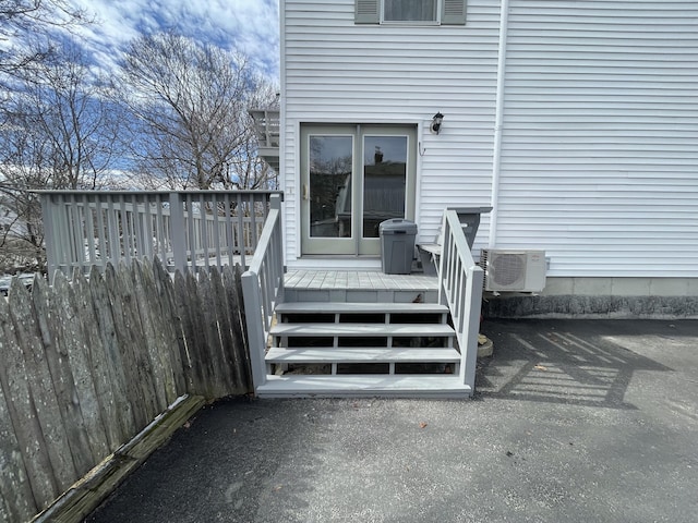 doorway to property with a wooden deck