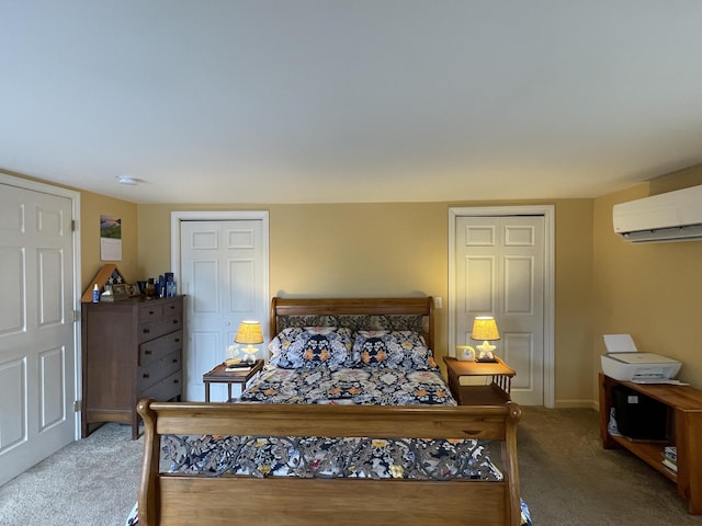 carpeted bedroom with a wall mounted air conditioner