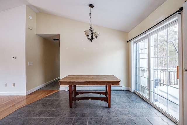 dining space with lofted ceiling, a baseboard heating unit, wood finished floors, a chandelier, and baseboards