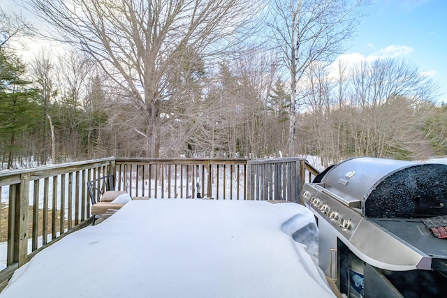 snow covered deck with area for grilling