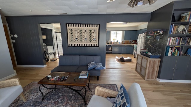 living area featuring light wood-style floors