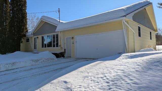 view of front of property featuring an attached garage