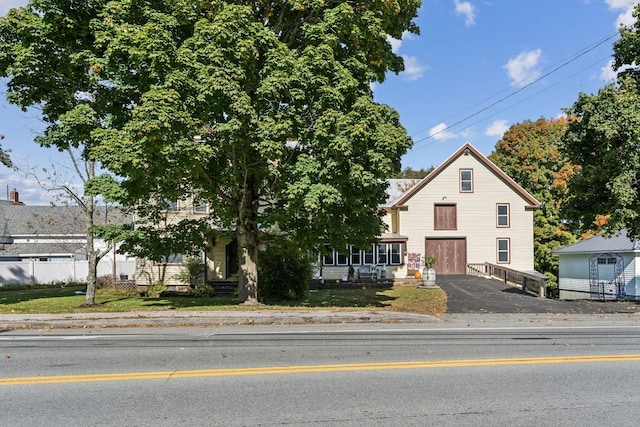 view of front of property with fence