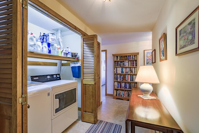 washroom featuring laundry area and independent washer and dryer