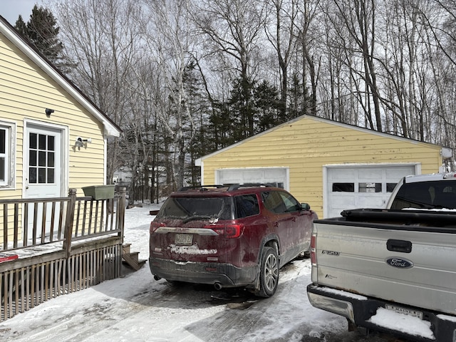 view of snow covered garage