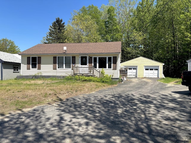 5 Grove St, Millinocket, ME 04462 - view of front of property featuring an outdoor structure and a detached garage