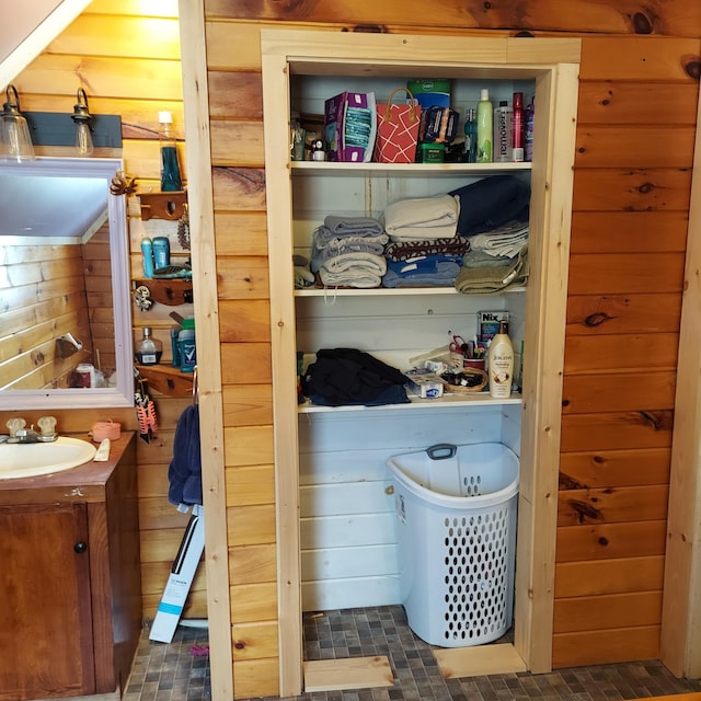 closet featuring a sink