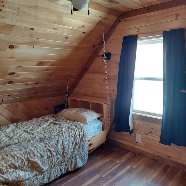 bedroom featuring vaulted ceiling, wood ceiling, wood finished floors, and wood walls