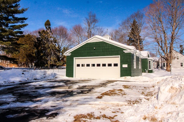 garage featuring driveway