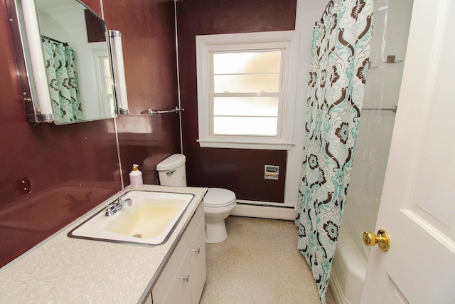 bathroom featuring a baseboard heating unit, curtained shower, vanity, and toilet