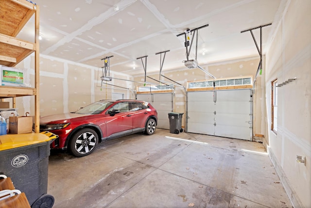 garage featuring a garage door opener