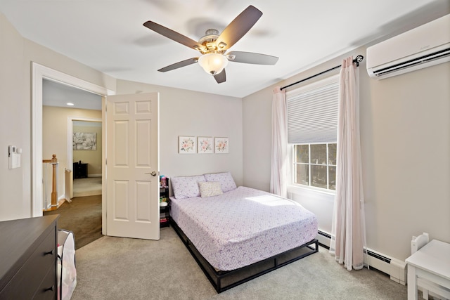 bedroom featuring a baseboard heating unit, an AC wall unit, light colored carpet, and ceiling fan