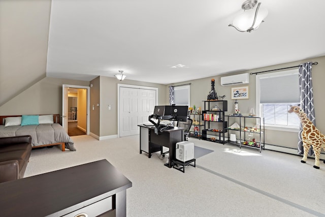 carpeted bedroom featuring a closet, baseboards, and a wall mounted AC