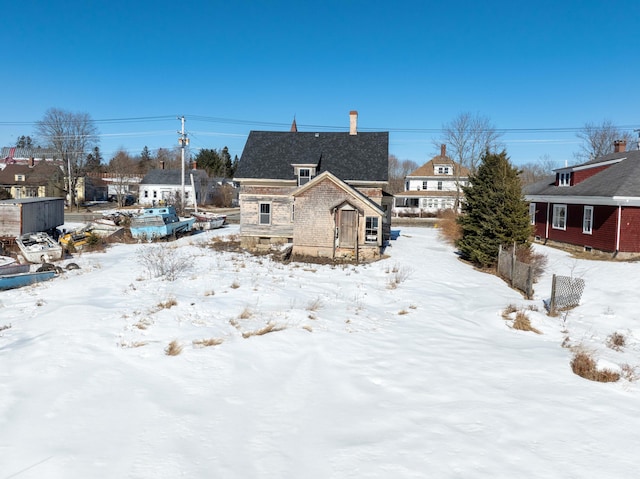 view of snow covered property