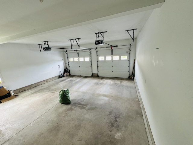 garage featuring a garage door opener