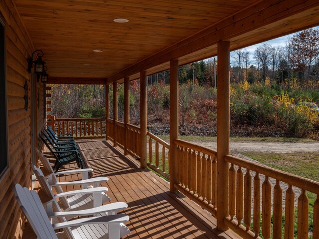 wooden deck featuring covered porch