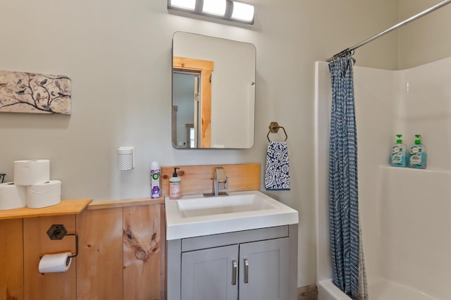 2342 Main St, Rangeley, ME 04970 - full bath featuring a shower with shower curtain and vanity