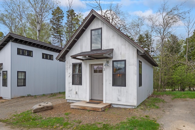 2342 Main St, Rangeley, ME 04970 - modern farmhouse style home featuring an outbuilding