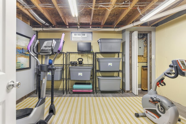 exercise area featuring electric panel