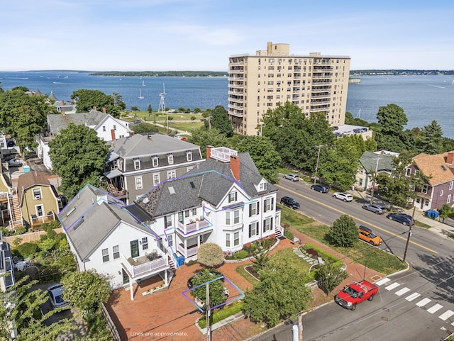 bird's eye view with a water view