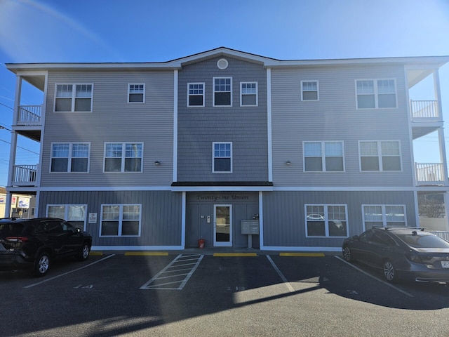 view of front of home with uncovered parking