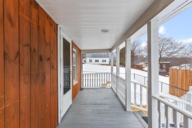 wooden deck featuring fence