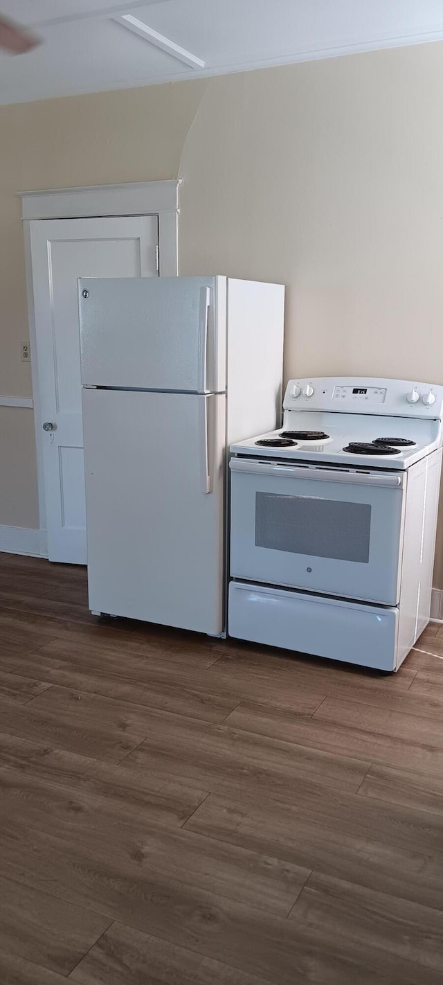 kitchen with white cabinetry, white appliances, and dark wood-type flooring