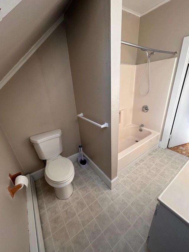 full bathroom with tile patterned flooring, crown molding, baseboards, toilet, and shower / bathtub combination