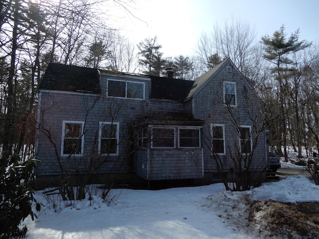 shingle-style home with a chimney