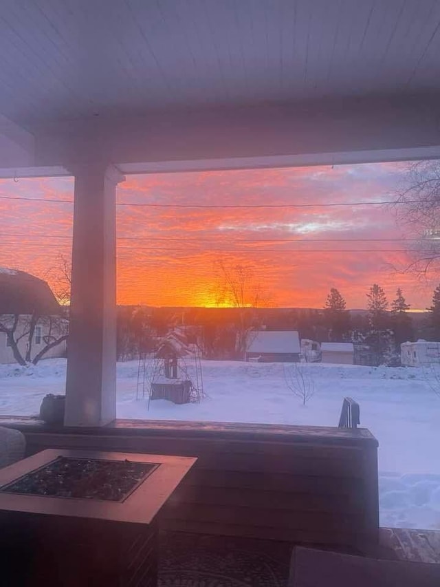 view of patio terrace at dusk