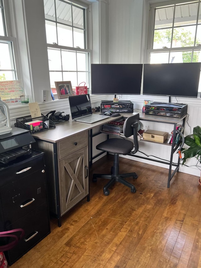 office space with a wealth of natural light and light wood-type flooring