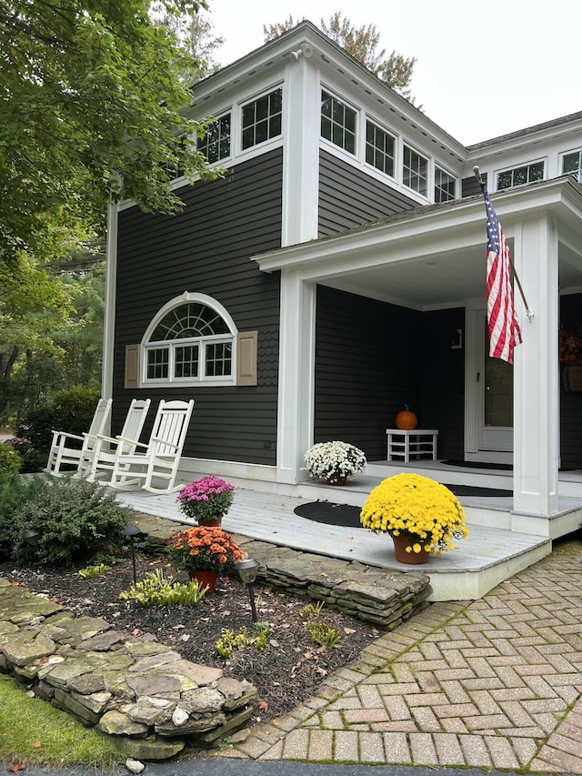 exterior space featuring covered porch