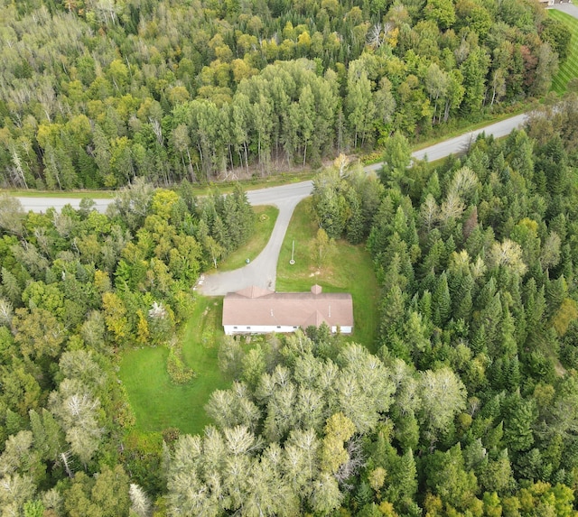 aerial view featuring a forest view