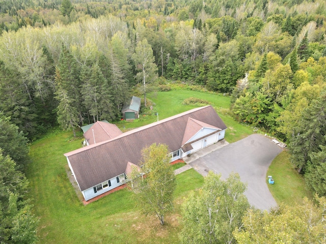 bird's eye view featuring a view of trees