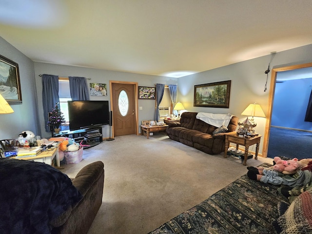 living area featuring carpet floors