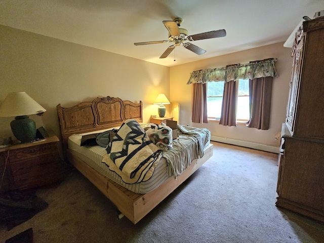 bedroom with ceiling fan, baseboards, a baseboard heating unit, and carpet