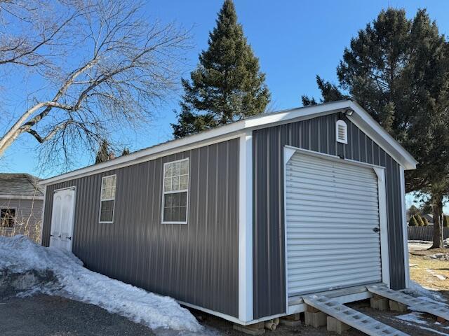 view of outbuilding featuring an outdoor structure