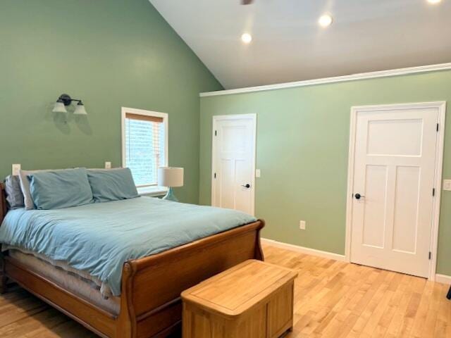 bedroom with recessed lighting, baseboards, light wood-style floors, and high vaulted ceiling