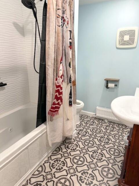 full bathroom featuring tile patterned flooring, shower / bath combination with curtain, toilet, and baseboards