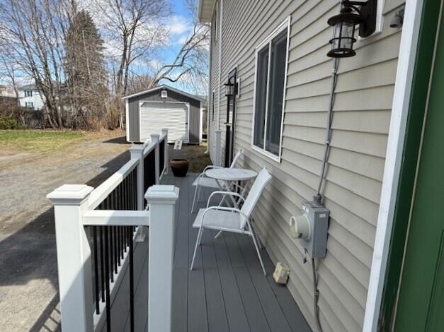 deck with an outdoor structure