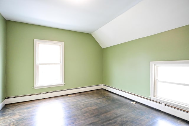 bonus room featuring vaulted ceiling and wood finished floors