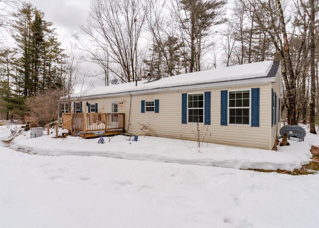 view of front of house with a wooden deck