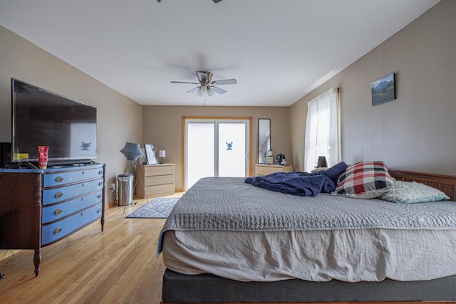 bedroom featuring a ceiling fan and wood finished floors