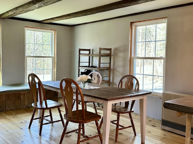 286 Lexington Rd, Kingfield, ME 04947 - dining space featuring beam ceiling, light wood-style floors, and healthy amount of natural light