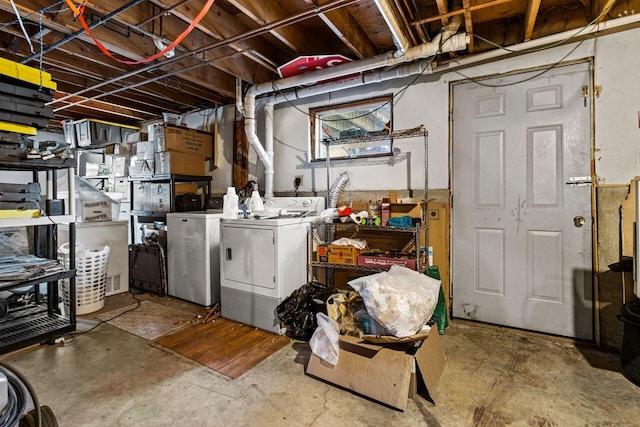 unfinished below grade area with washing machine and dryer